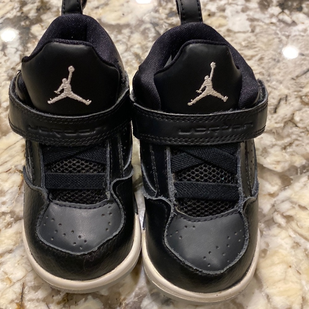 EUC baby Air Jordan black tennis shoes size 6c